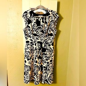 Elle dress size L. Black & cream abstract floral design.